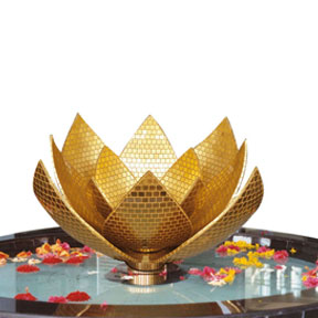 Golden lotus sculpture in a pond