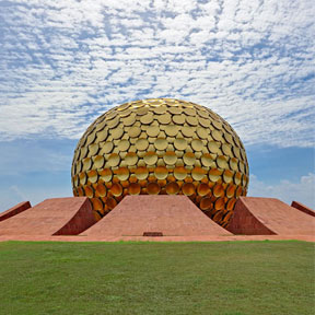Matrimandir beneath a blue sky